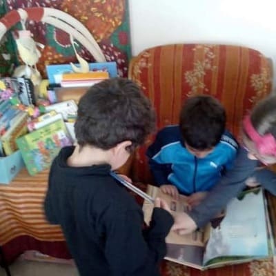 Lecture chez assistante maternelle Christine EL KHALIL Montgeron activité.